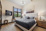 Master bedroom features a king bed 
